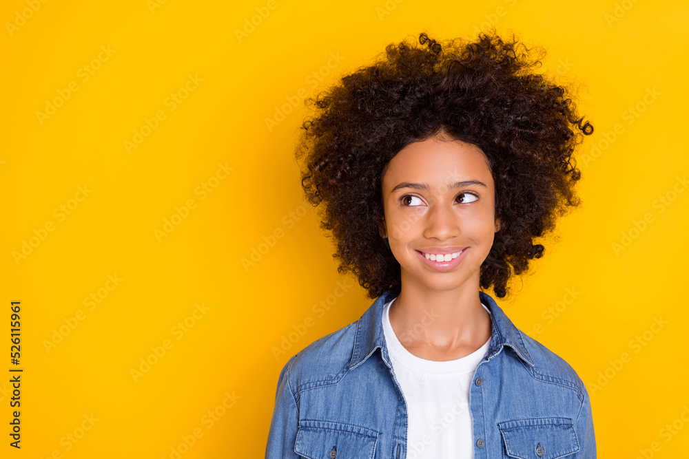 Portrait of attractive cheery minded wavy-haired girl thinking copy blank space isolated over bright yellow color background Portrait of attractive cheery minded wavy-haired girl thinking copy blank space isolated over bright yellow color background