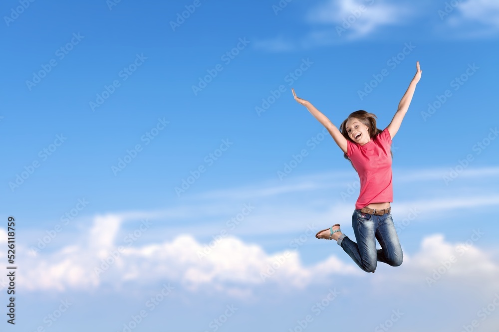 Young smiling happy woman jump high. People lifestyle concept