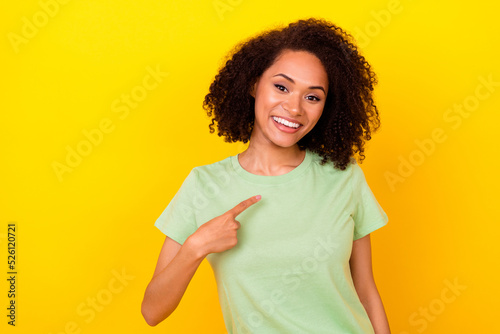 Photo of sweet charming lady wear green t-shirt pointing finger herself empty space isolated yellow color background