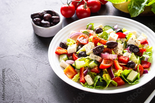 Greek salad. Vegetable salad with tomato, cucumber, feta cheese and olive oil.