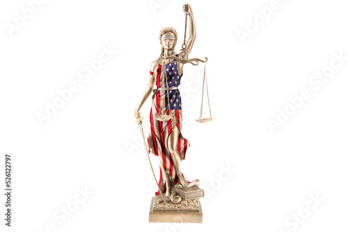Eine Justitia Statue trägt die National Flagge der USA als Kleid. Sie tritt auf eine Schlange und hält eine Waage in der Hand. Weißer Hintegrund. photo
