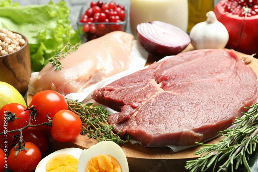 Fresh meat and other products for balanced diet on table Fresh meat and other products for balanced diet on table