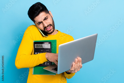 Murais de parede Photo of handsome busy guy dressed yellow pullover working modern gadgets prepar