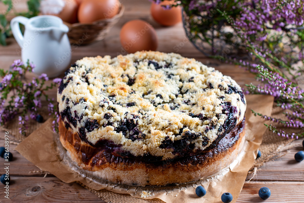 Fresh Baked Homemade Blueberry Cake on wooden table Fresh Baked Homemade Blueberry Cake on wooden table