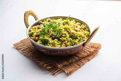 Palak khichdi is a one pot nutritious meal of mung lentils and rice with spinach, Indian food photo