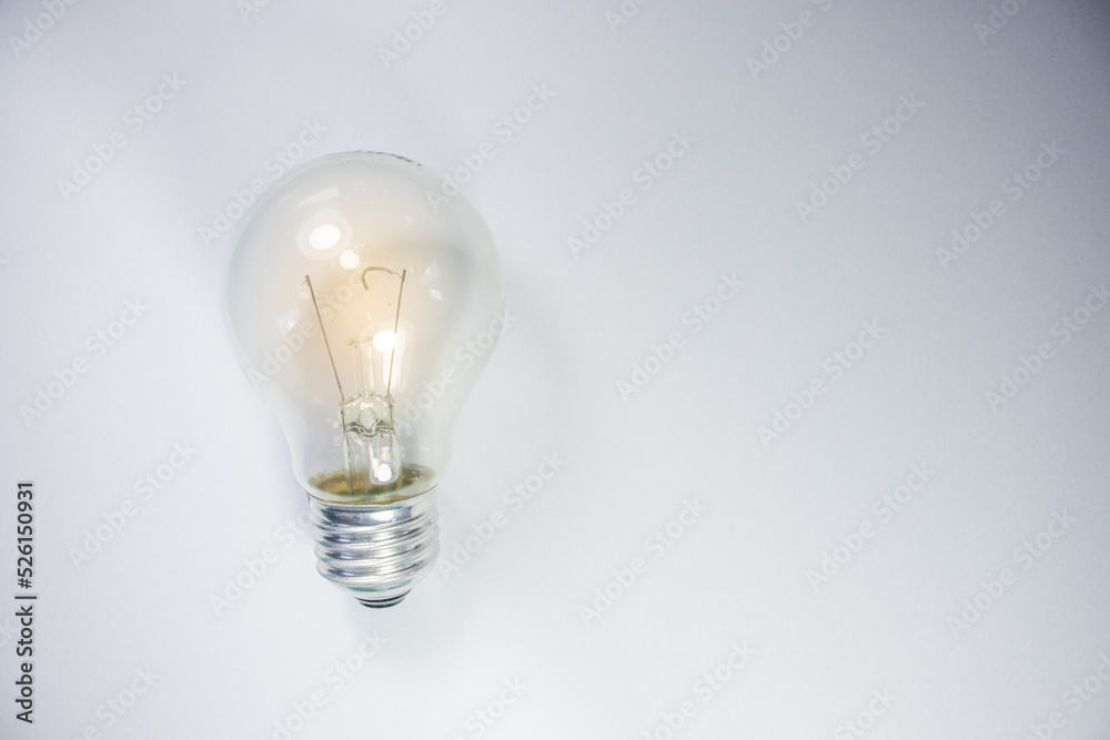 Incandescent Light Bulb on White Background