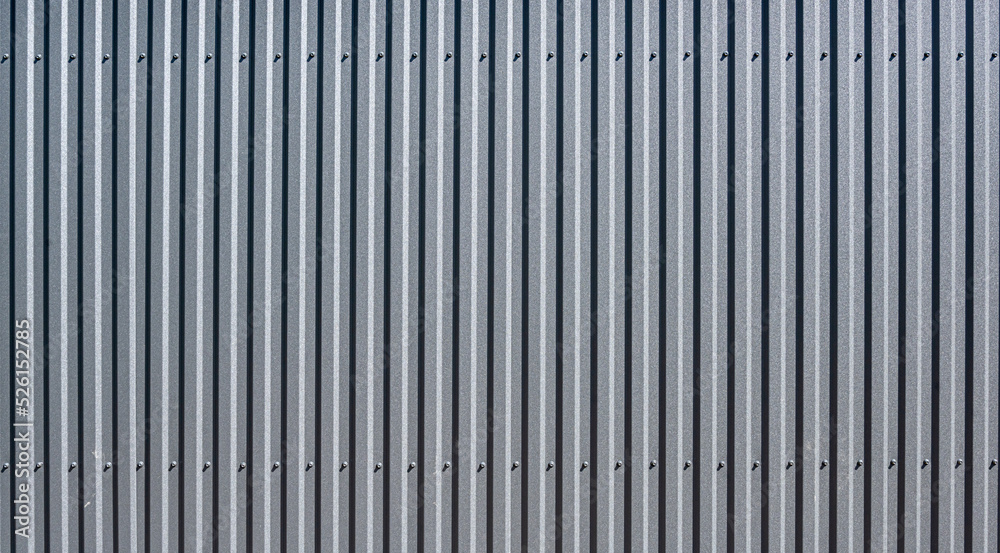 The texture of a professional sheet or corrugated metal sheet as an abstract background.