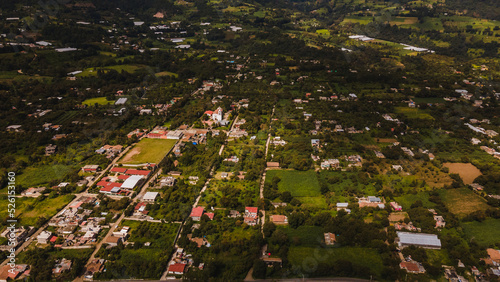 Aerial photo of the municipality of Almoloya de Alquisiras, the landscape, trees, mountains and the houses of the town are distinguished photo