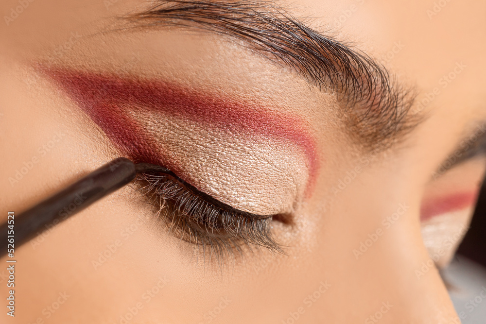 Naklejka premium Macro close up of eyeliner brush, make up concept.