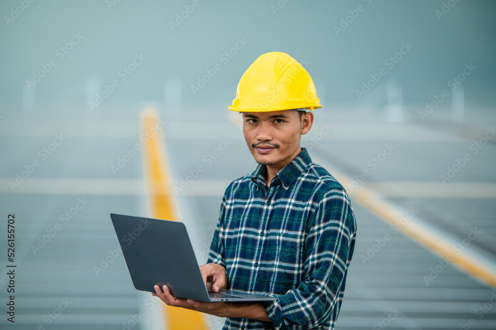 Asian engineer solar cell factory working with safety helmet outdoor Asian engineer solar cell factory working with safety helmet outdoor