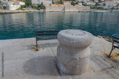 Wind rose on a pillar in the old town of Dubrovnik photo