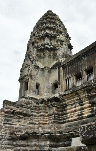 One Tower of Angkor Wat with Overcast Sky, Low Angle Portrait © Globepouncing