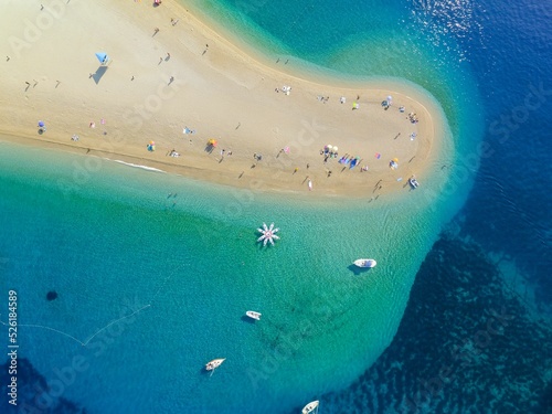 Fototapeta Naklejka Na Ścianę i Meble -  Beautiful aerial view of the Zlatni Rat Golden Horn Beach in Croatia. 
Perfect for a background.