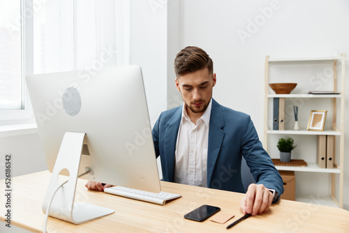 handsome businessman computer desktop work self-confidence technologies