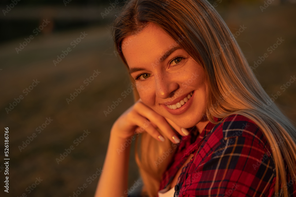 Happy mature woman with arms. Beautiful young woman feeling good and enjoying freedom, copy space Happy mature woman with arms. Beautiful young woman feeling good and enjoying freedom, copy space