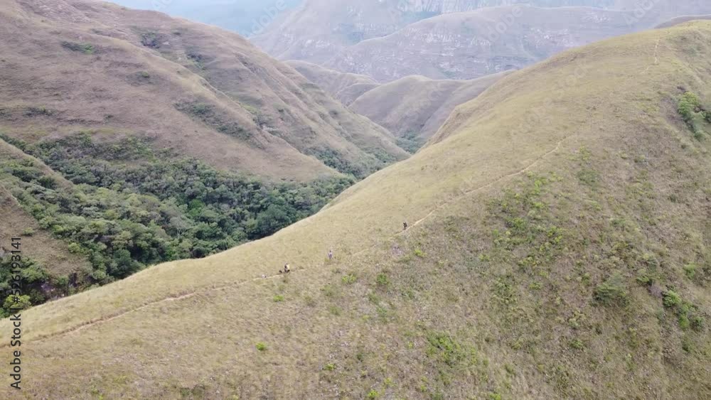 Group of young people hiking in the mountains near Samaipata Bolivia - CODO DE LOS ANDES - SANTA CRUZ BOLIVIA Group of young people hiking in the mountains near Samaipata Bolivia - CODO DE LOS ANDES - SANTA CRUZ BOLIVIA