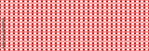 Christmas tablecloth in a red check. Seamless pattern.