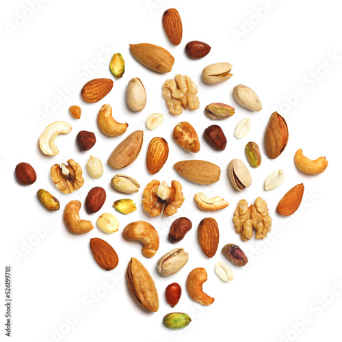 Pattern of nuts in the form of a rhombus Various nuts isolated on white Pecans macadamia nuts brazil nuts walnuts almonds hazelnuts pistachios cashews peanuts, pine nuts Top view Flat Сopy space