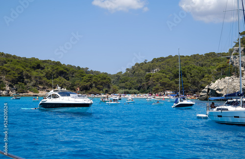 Menorca, Spain: Beautiful bay with sailing boat catamaran