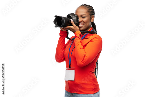 Fotografie people, profession and photography concept - happy young woman or press photogra