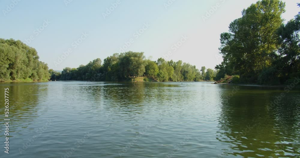 Rivers delta landscape on a sunny day in the summer season, motion view from the boat. Rivers delta landscape on a sunny day in the summer season, motion view from the boat.