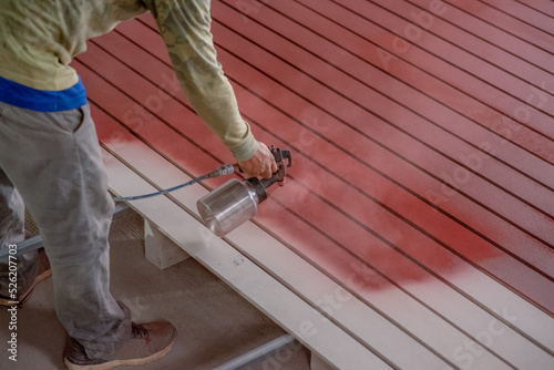 Professional painters are painting the interior of the house.
