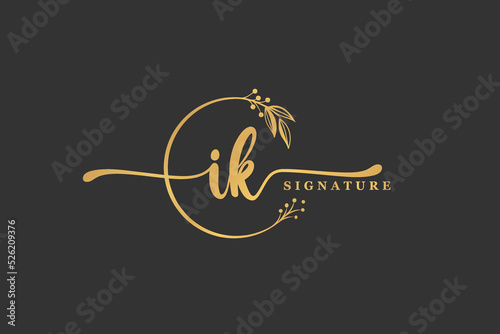 luxury gold signature initial I K logo design isolated leaf and flower
