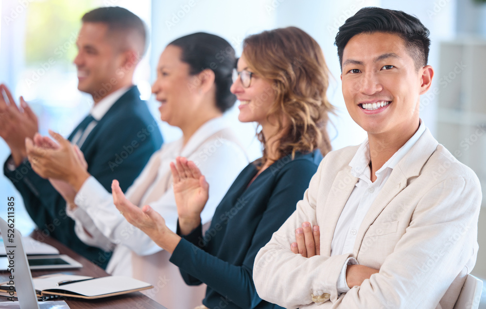 Teamwork, motivation and celebration with clapping business people cheering during speech or presentation. Portrait of a happy employee enjoying his career while sitting with diverse team in training Teamwork, motivation and celebration with clapping business people cheering during speech or presentation. Portrait of a happy employee enjoying his career while sitting with diverse team in training