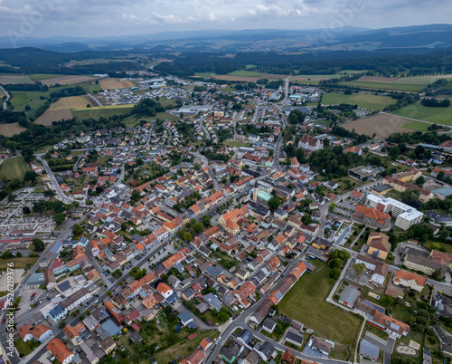 Aerial view around the town Vohenstrauß in Germany, on a cloudy day in summer.