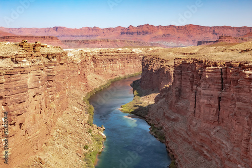 Colorado river canyon and red rock mountain view from Navajo Bridge in northern Arizona desert photo