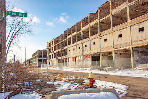 Old abandoned Packard factory manufacturing plant building in Detroit Michigan on a cold winter snow day photo