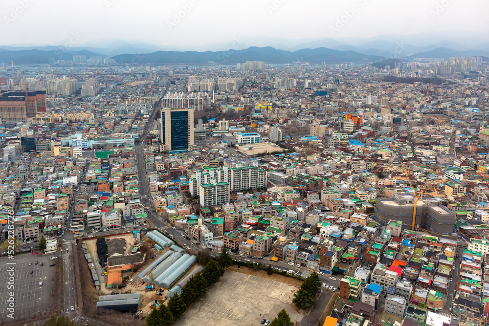 Daegu South Korea city skyline buildings from Duryu Park on a cloudy winter day	