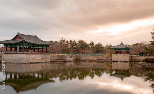 Traditional Korean pagoda temple reflection at Wonji Pond in Gyeonju South Korea during sunset