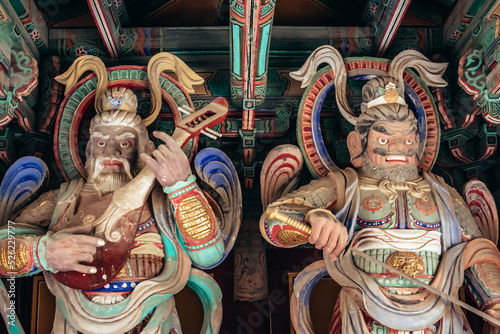 Colorful Nio guard statues at the entrance of Bulguksa Temple in Gyeongju South Korea photo