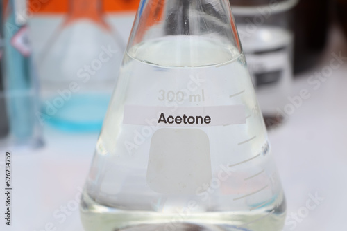 acetone in glass, chemical in the laboratory and industry photo