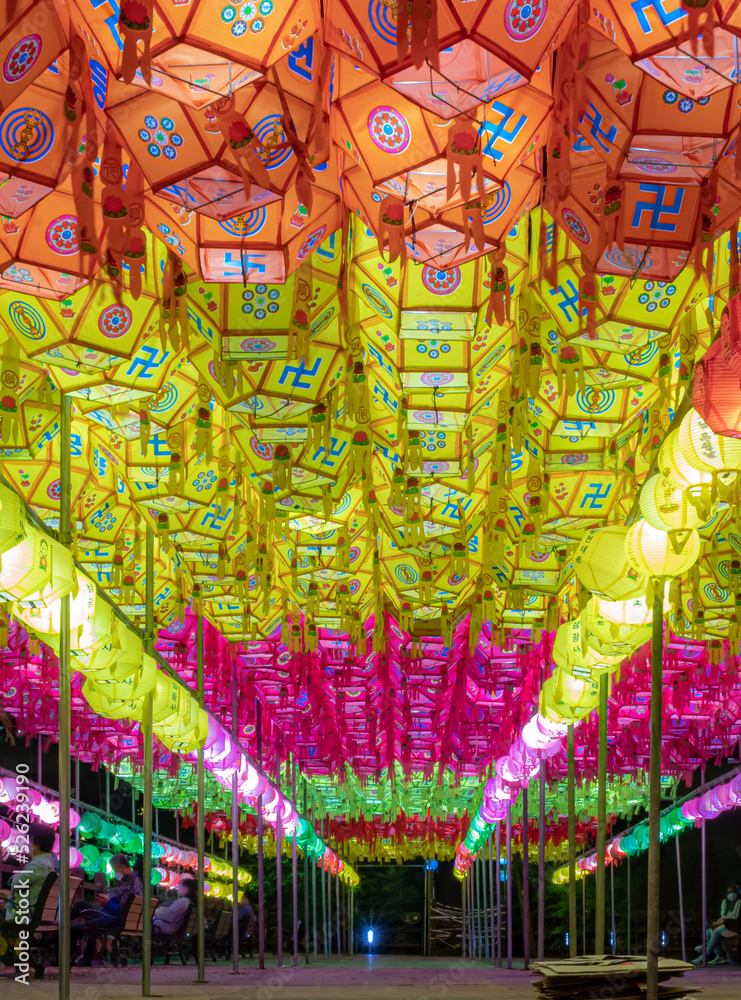 Naklejka premium Colorful lanterns at the Samgwangsa Buddhist temple for Buddha's birthday festival in Busan South Korea at night