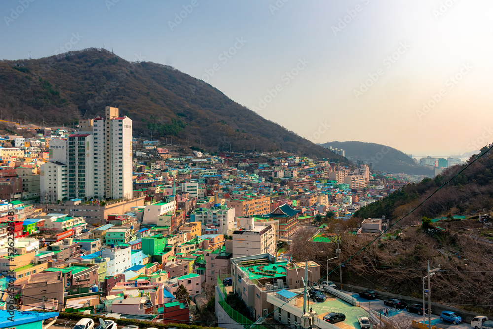 Colorful city village houses view of Gamcheon Cultural Village and mountains in Busan South Korea during sunset