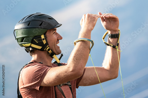 A paraglider pilot, instructor explaining theory