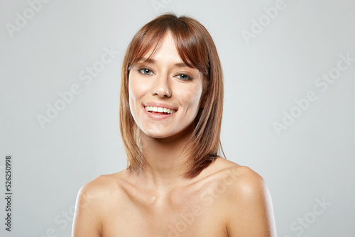 Happy young woman. Beautiful smiling Lady