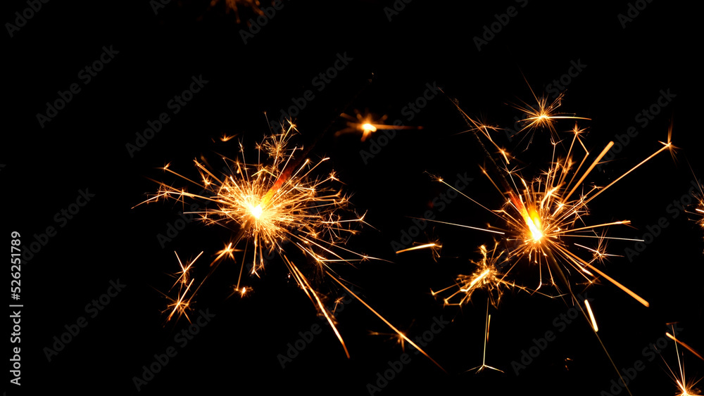 sparkler celebrating new year at night on black background sparkler celebrating new year at night on black background