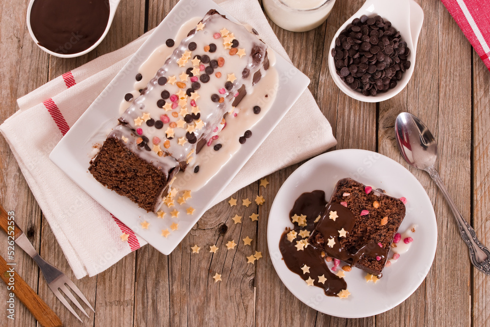 Sponge cake with white frosting and sugars. Sponge cake with white frosting and sugars.