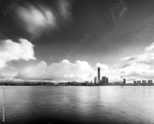 Fototapeta Naklejka Na Ścianę i Meble -  Morning clouds.  Early morning long exposure over Victoria Harbour, Hong Kong with an iPhone and tripod.