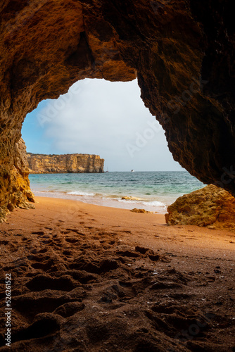 Natural cave in the Algarve on the beach at Praia da Coelha  Albufeira. Portugal