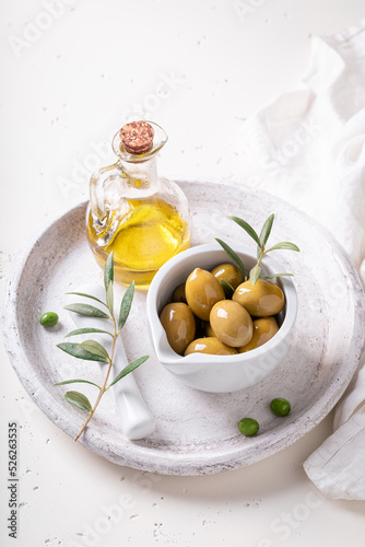 Green and tasty olives with extra virgin olive oil.