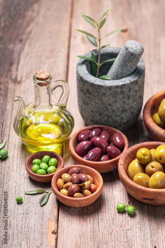 Fototapeta Naklejka Na Ścianę i Meble -  Tasty and healthy olives as summer Greek preserves.