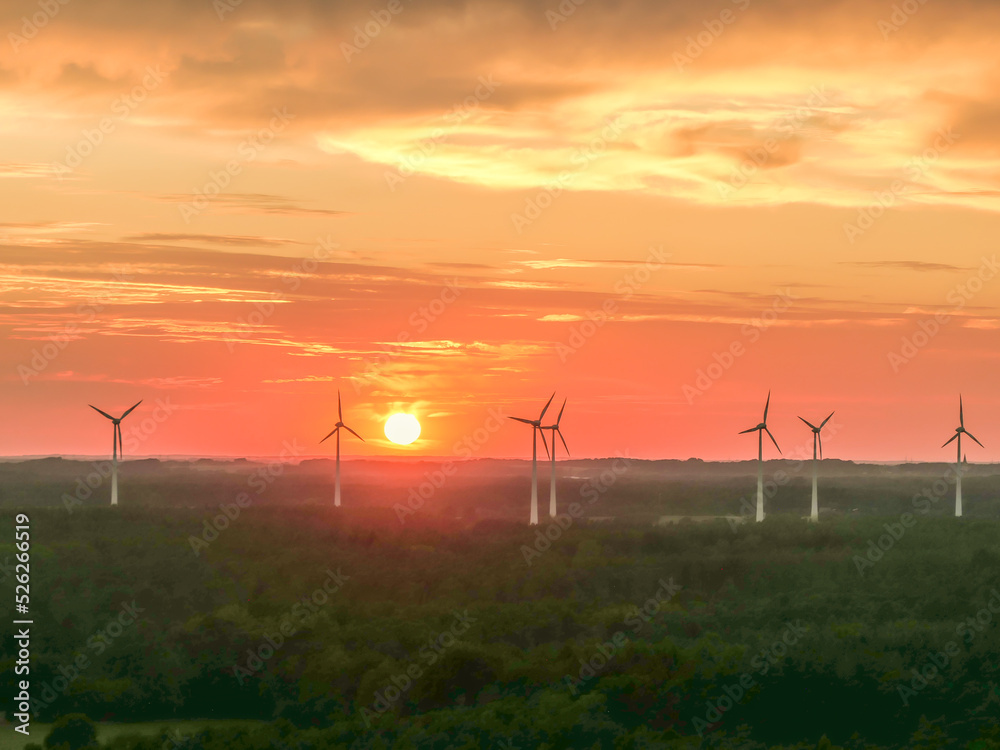 Fototapeta premium wind turbines at sunset