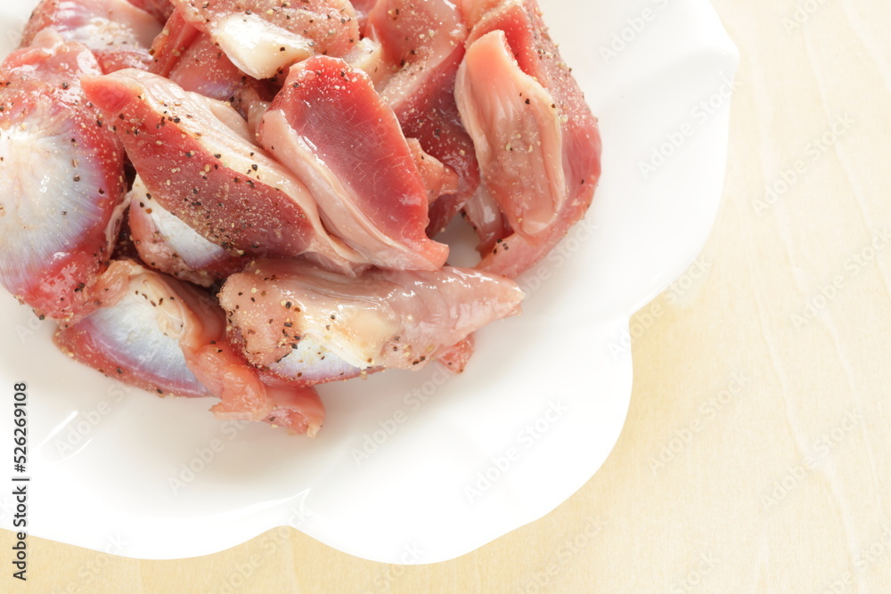 prepared chicken gizzard , pepper and salt seasoning prepared chicken gizzard , pepper and salt seasoning