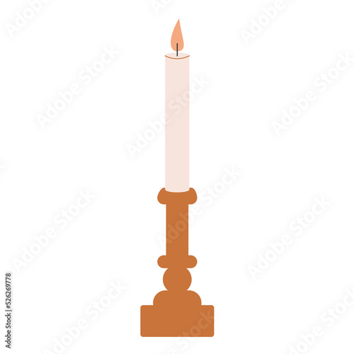 A candle and a candlestick for a cozy dinner. Wedding decor. wax and wooden decoration