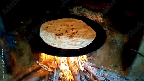 Pakistani  traditional wooden  stove .  Baking Pakistani bread or chapatti. wheat  flour bread. 