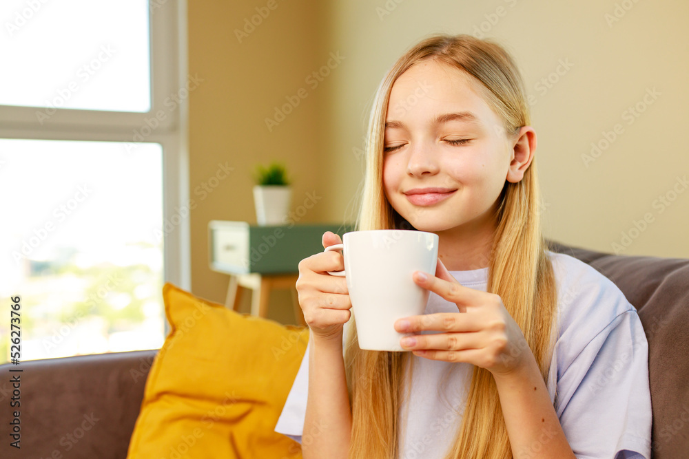 cute little blonde girl enjoy hot chocolate in living room before go to school eyes closed cute little blonde girl enjoy hot chocolate in living room before go to school eyes closed